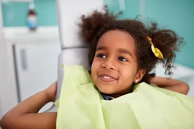 smiling girl at dental office
